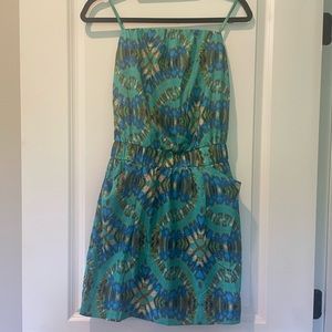 Boutique strapless multi color dress with cinch waist and pockets